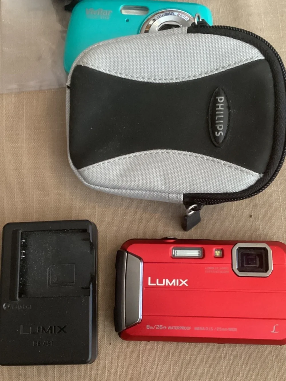 LUMIX digital camera w/ charger and VIVITAR digital cameras